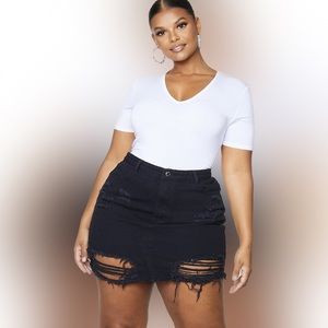 Plus size black denim ripped miniskirt